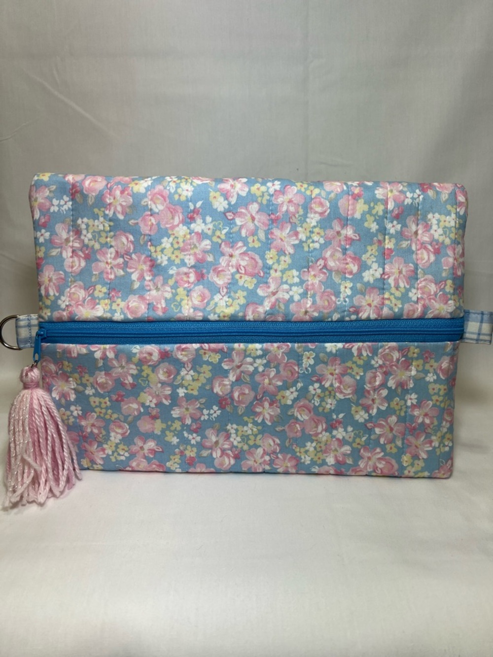 Handmade Blue Floral Cosmetic Pouch with Pink Tassel Accent
